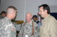 Minnesota governor Tim Pawlenty and LTG Steven H. Blum of the National Guard Bureau take time and gr...