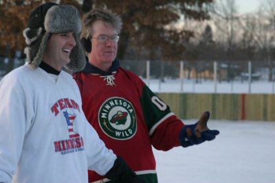 Governor Pawlenty and St. Paul Mayor Chris Coleman take a break from playing hockey with local kids ...