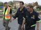 Governor Pawlenty, Mayor of Hugo, Fran Miron (left) and Hugo Fire Chief Jim Compton (Right), inspect...