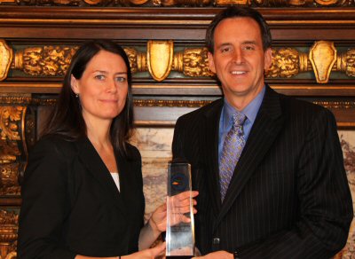 Governor Pawlenty visits with Martha Spriggs, a seventh grade Math teacher at Andersen United Commun...